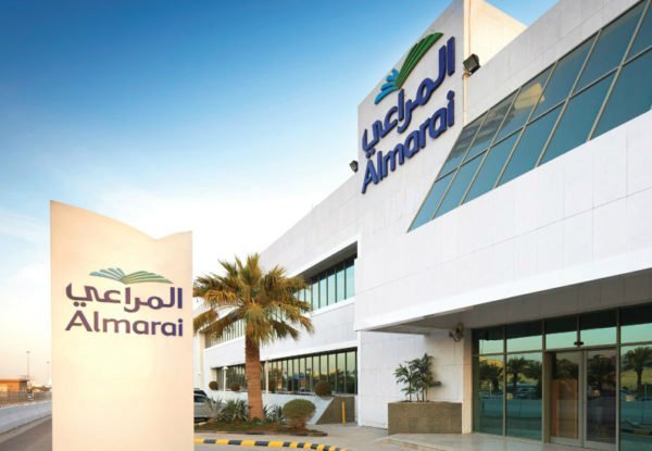 Almarai team members in safety gear